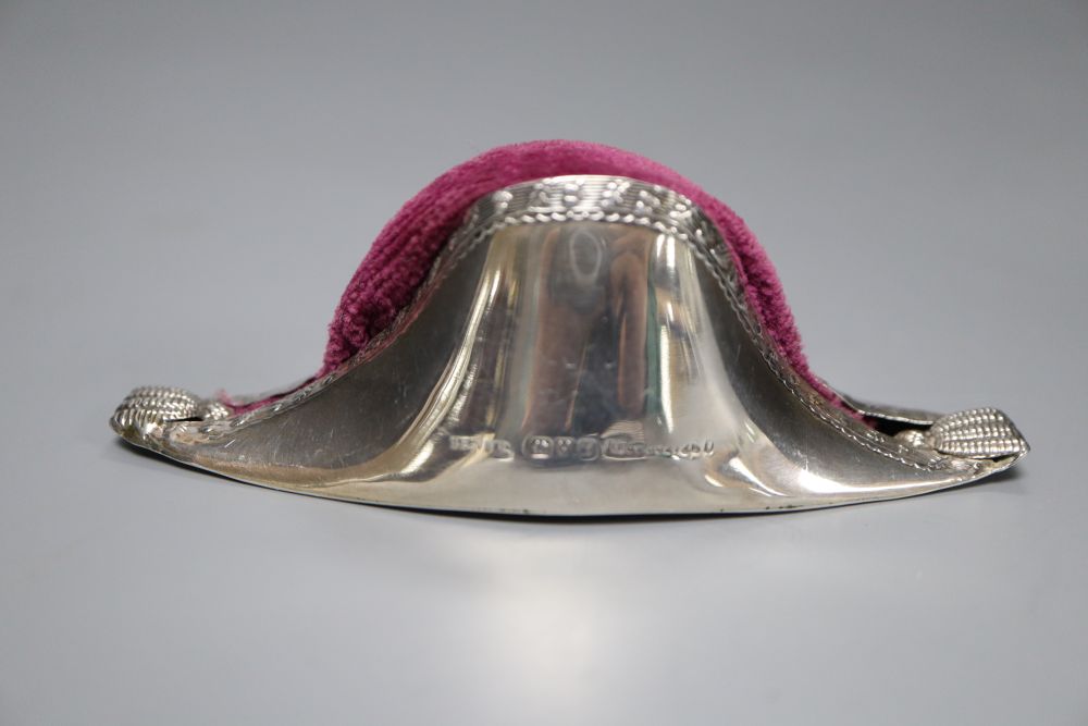 An Edwardian novelty silver pin cushion, modelled as a Napoleon hat, S. Blanckensee & Son, Chester, 1908, 10.3cm.